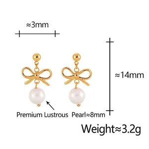Elegant gold bow earrings with 8mm white pearls and size measurements on white background