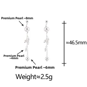 Detail of elegant pearl tassel earrings with dimensions of 46.5mm length and 2.5g weight