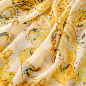 Macro detail of Bohemian paisley print on lightweight linen-cotton scarf fabric