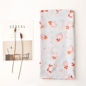Floral cotton linen scarf in light blue with berry print for beach sun protection