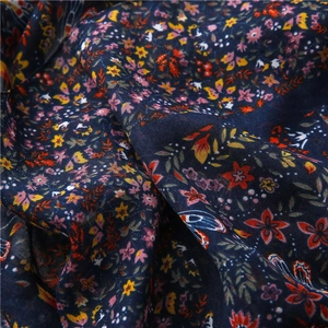 Ethnic style navy cotton linen shawl with colorful floral patterns and tassels