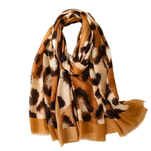 Fashionable long leopard print scarf for women made of lightweight cotton and linen blend