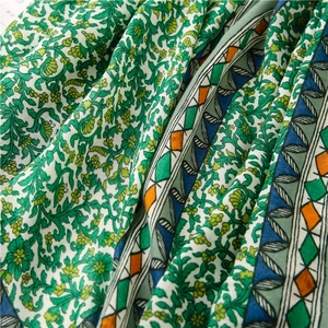 Close-up of floral and geometric print on lightweight cotton linen beach scarf