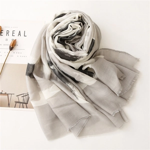 Artistic ink-wash geometric scarf with delicate fringe edges and light linen texture