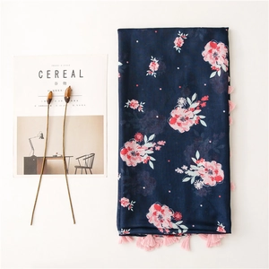 Floral cotton linen scarf in navy blue with pink flowers and fringe tassels