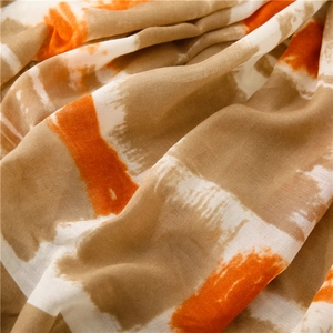 Macro detail of abstract geometric cotton linen scarf with soft artistic brushstroke texture
