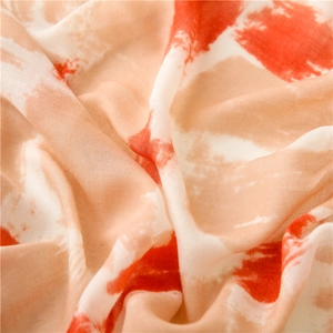 Close-up of abstract geometric cotton linen scarf with soft breathable fabric texture