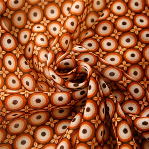 Macro detail of geometric concentric patterns on soft cotton linen scarf fabric