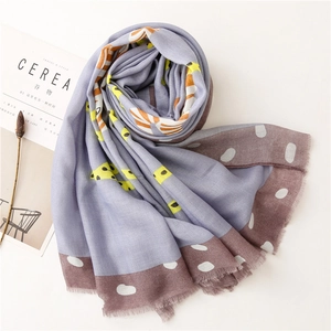 Detail of artistic cotton linen scarf with zebra print and soft frayed edges