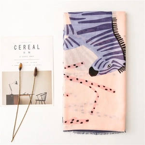 Detail view of abstract zebra print cotton linen shawl with delicate fringe edges