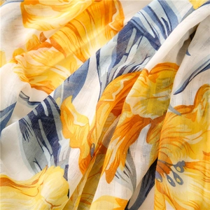 Macro shot showing soft texture and floral print on cotton linen feel scarf shawl
