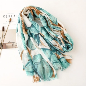 Lightweight cotton linen floral print scarf with blue leaf patterns for women