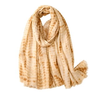 Lightweight tie-dye cotton linen scarf with soft waves in light brown and beige tones