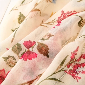 Close-up of floral print scarf with mesh texture and white sequin embroidery details