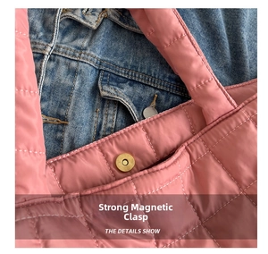Detailed close-up of pink quilted tote bag showing the strong magnetic snap closure