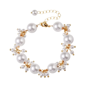 Elegant white pearl cluster bracelet with golden metal weaving and lobster clasp