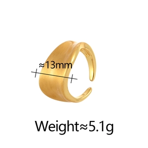 Irregular brushed gold open ring with minimalist twisted wave design and 13mm wide band