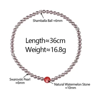 Bracelet double rangée en perles grises avec boule de cristal et pendentif pierre rouge