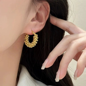 Elegant gold woven texture sphere earrings with a polished beaded design for women