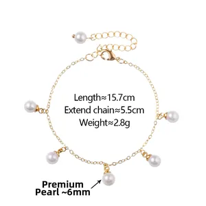 Dettaglio del bracciale dorato con sei perle da 6mm e misure di precisione