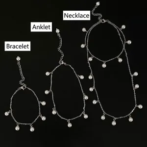 Set di gioielli in argento con perle incluso collana bracciale e cavigliera elegante