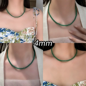 Detail of 4mm green chalcedony beaded necklace on model with diverse outfits