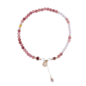 Pink strawberry crystal and pearl bracelet with golden Fu pendant in neo-Chinese style