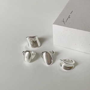 Minimalist high-polish liquid metal rings in various irregular artistic designs for women