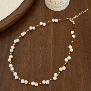 Collier double rang de perles élégantes avec perles dorées et fermoir ajustable