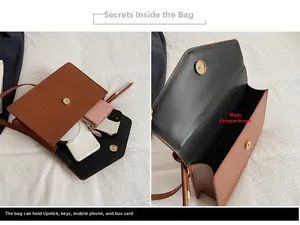 Internal view of brown croc-effect crossbody bag showing main compartment storage