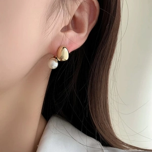 Minimalist gold bean pearl stud earrings featuring a double-sided water drop design for women