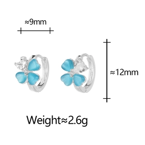 Detail view of four-leaf flower earrings with blue cat eye stone and cubic zirconia size info
