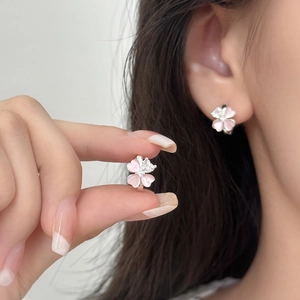 Elegant four-petal pink zircon flower earrings with silver frame and sweet minimalist design