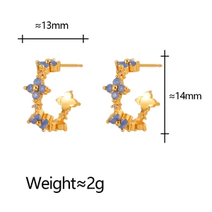 Detail showing dimensions of gold flower earrings with blue cubic zirconia stones