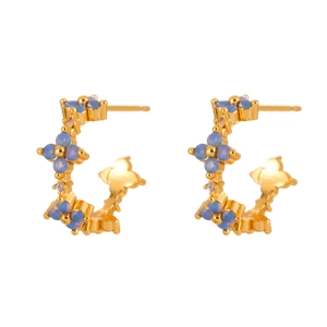 Elegant gold C-shaped hoop earrings featuring light blue zircon flower petals for women