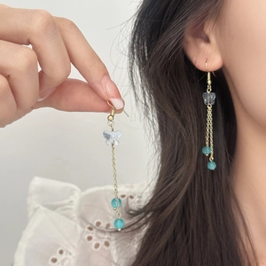 Elegant cat eye stone butterfly tassel earrings with blue beads and gold chains