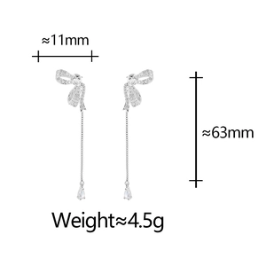 Detail view showing dimensions of bowknot tassel earrings with zircon drop pendant
