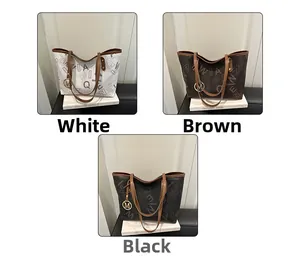 Detailed comparison of three printed tote bags in white, brown, and black with metal charms