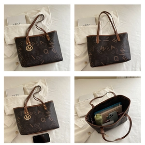 Internal view of a printed tote bag showing large capacity for phone, tablet and umbrella