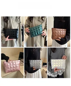 Quilted nylon cosmetic bags shown in six colors on models for a versatile fashion look