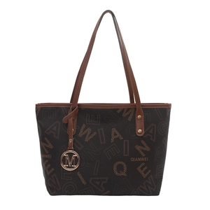 Brown leather tote bag with letter print patterns and golden metal charm detail