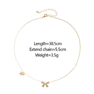 Collier élégant en or avec pendentifs nœud en zircone et chaîne réglable pour femmes
