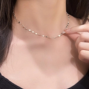 Elegant silver heart link choker necklace for women featuring a minimalist wavy shimmer