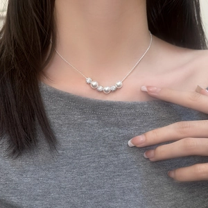 Elegant French vintage pearl necklace featuring three lustrous pearls and paved crystal beads