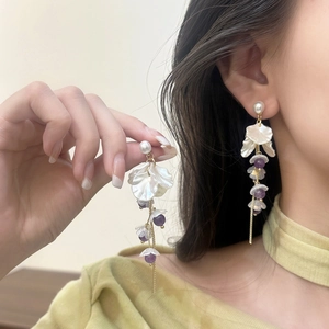 Elegant pearl and purple crystal flower petal tassel earrings with gold chains for women