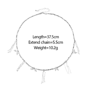 Elegant silver tassel necklace with white pearls and minimalist hanging fringe chains