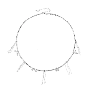 Silver bead collar necklace featuring white pearls and delicate tassel fringes on white back