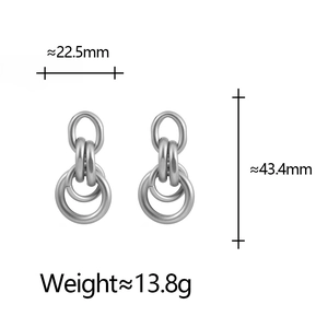 Boucles d'oreilles géométriques en métal argenté avec spécifications de taille et poids