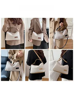 Six different views of white canvas tote bag with brown trim showing various carrying styles