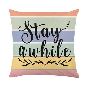 Striped decorative pillow cover with Stay Awhile print and floral vine design